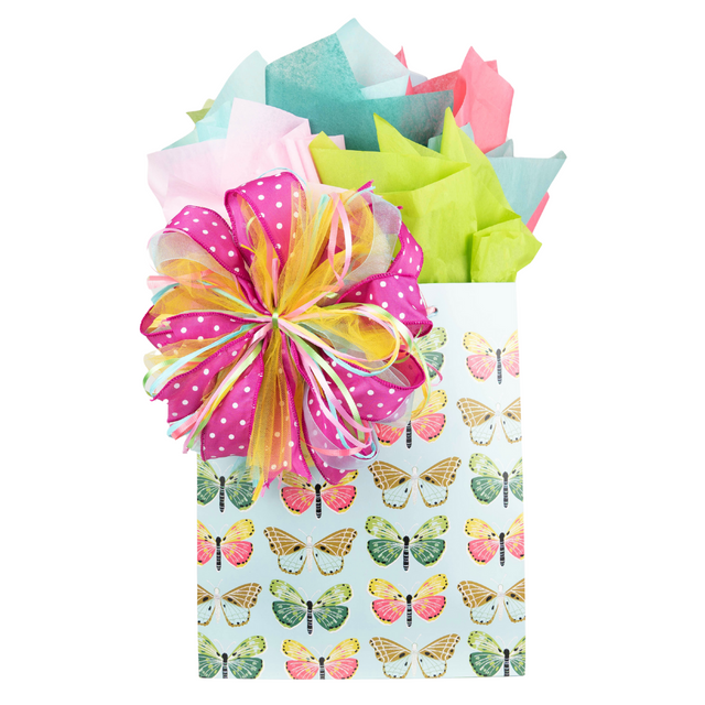 Butterfly patterned gift bag with matching pink, green, and blue tissue paper and bow