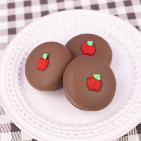 Just Picked Apples Oreo – crunchy Nabisco cookie dipped in creamy milk chocolate and decorated with apple-inspired fall designs from Nibbles & Bits.