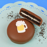 Milk chocolate beer mug Oreo showing dark chocolate cookie layers and white cream filling on a mint green plate with blue background, handcrafted novelty chocolate gift by Nibbles and Bits Scranton PA.