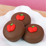 Milk chocolate covered Oreo decorated with an adorable chubby red apple fondant decal, handmade back to school treat and teacher appreciation gift by Nibbles and Bits Scranton PA.