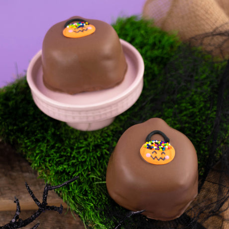 Pumpkin-shaped peanut butter crème double dipped in creamy milk chocolate – handmade Halloween candy from Nibbles & Bits in Scranton, PA